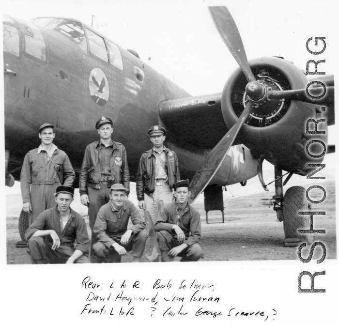 Flyers with B-25 Mitchell bomber.  Rear: Bob Selmer, David Hayward, Jim Curran.  Front: George Scearce (center).  22nd Bombardment Squadron, in the CBI.