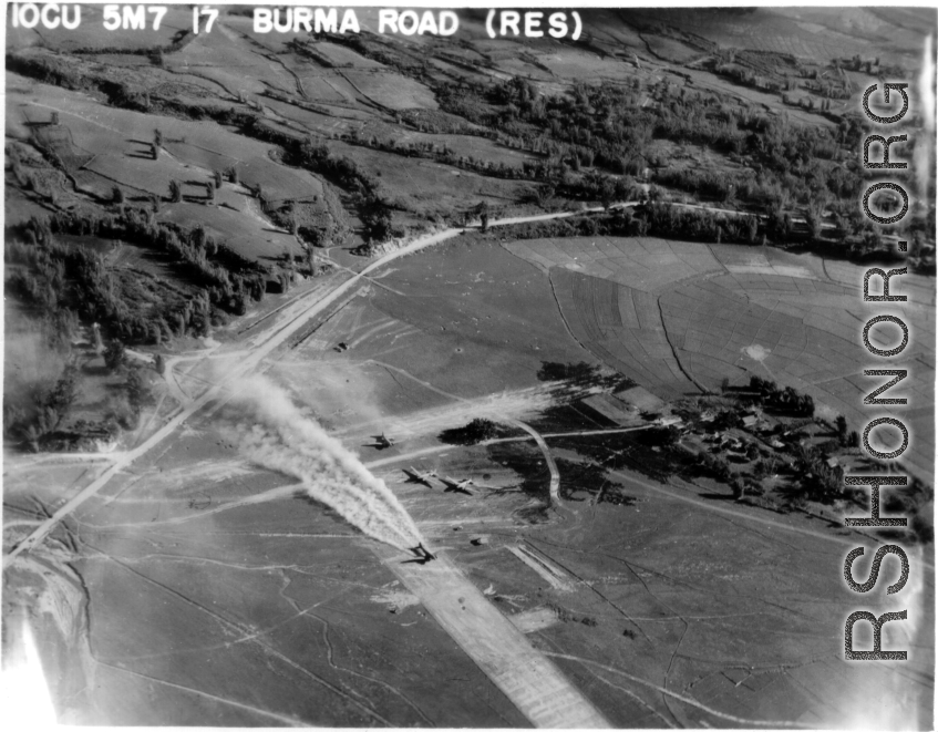 10CU 5M7 17 BURMA ROAD (RES). An Airplane prepares to take off from a rough air strip in Burma.
