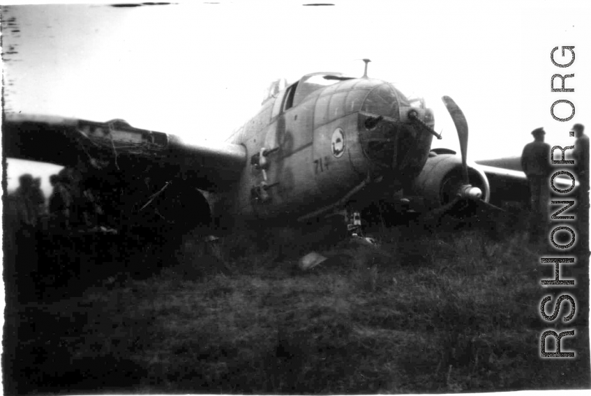 12th Air Service Group mechanics salvage what they can from crashed B-25 in China during WWII.