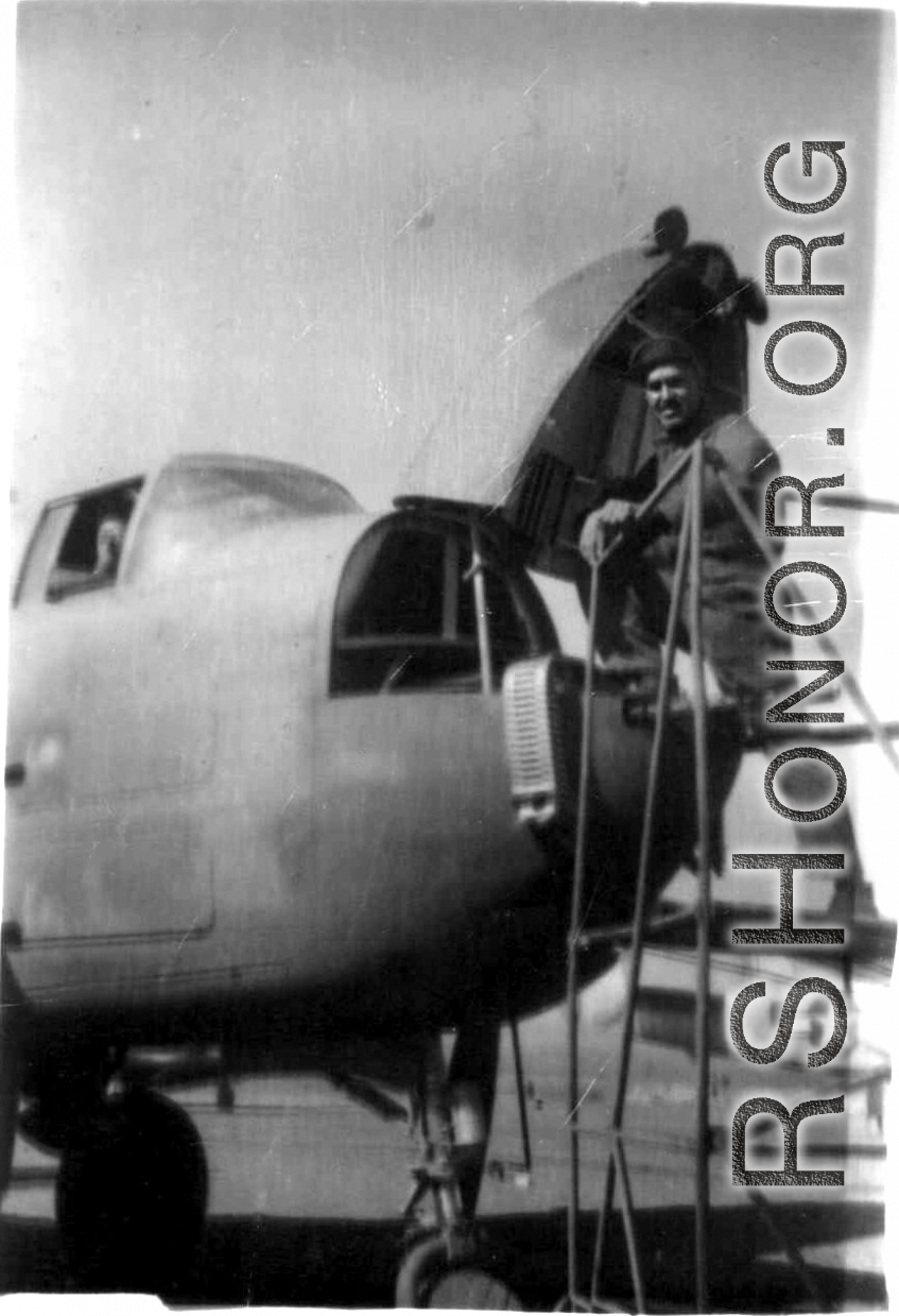 An American armorer prepares a B-25. In China during WWII.