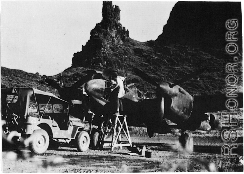A 21st Photographic Reconnaissance Squadron F-5 being serviced in Guangxi province, at either Liuzhou or Guilin.  Original can be found at National Archives and Records Administration. Caption for the photo is: "Camera Repairmen Of The 21St Photographic Reconnaissance Sqd. Work On A Lockheed F-5A Reconnaissance Plane In A Natural Revetment Formed By The Limestone Buttes At A Forward Base In China." (Info thanks to TexLonghorn)