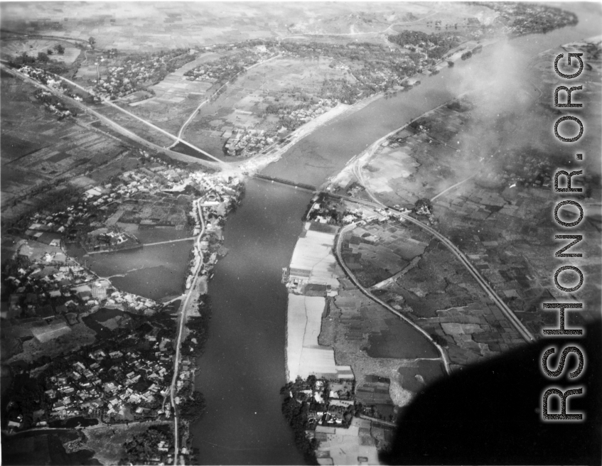 Bombing of Đò Lèn Bridge in Hà Trung Town in French Indochina (Vietnam), during WWII. In northern Vietnam, and along a critical rail route used by the Japanese.