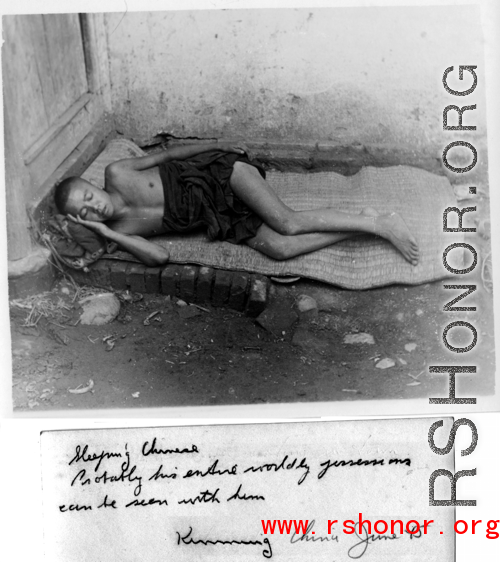 Impoverished Chinese man sleeping, Kunming, china, June 1945.
