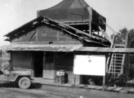 "The observation platform atop the control tower at liberated Hankou (Hankou) Air Base was an excellent place to pitch a pyramidal." During WWII.