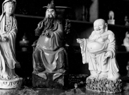Porcelain statuettes in a shop in China. During WWII.