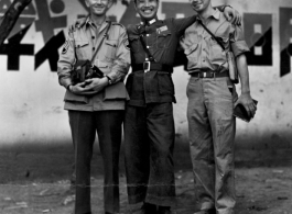Chinese and American soldiers pose in friendly fashion the CBI during WWII. Eugene Wozniak is on the right.