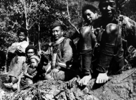 Several tribal people in SW China or Burma during WWII.