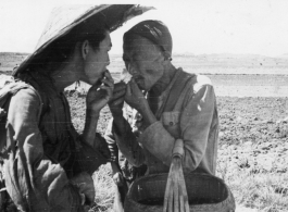 Farm men in rural China near an American base during WWII.