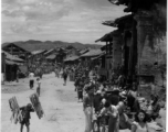 A village in SW China, on market day. In the CBI during WWII. 