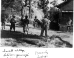 Chinese farmers thresh grain in a small village between Yunnanyi and Kunming, during WWII.  Photo from Beverly Hodges.