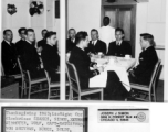 "Thanksgiving 1943. Left to right center clockwise: Shanks, Simo, Widmoyer, Wolf, Capt Ratchford, Von Breyman, Burke, Boldt, Simonette & Sullivan. Howard M. Sharp is the Black mess attendant, and presently a magician in Washington D. C., name of HOSHA."  Photo from Joseph J. Simon.