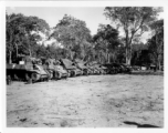Tanks parked along Burma Road.  797th Engineer Forestry Company in Burma.  During WWII.