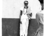 A GI takes picture of sadhu in India, as seen by men of the 2005th Ordnance Maintenance Company, 28th Air Depot Group, in India during WWII.