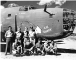  "C. E. 'Shack'" with crew on the ground. 425th Bomb Squadron, 308th Bombardment Group.  Names painted on the nose of "C. E. 'Shack'" include those of 2nd Lt. Gordon C. Weems (copilot), 2nd Lt. Charles R. Thompson (navigator), and an unknown "Chick," who was possibly bombardier. (Info courtesy of deployment name list.)