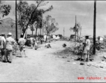 Retreat from Guilin, 1944.  This looks like engineers are planting mines before the Japanese enter the city.  Note the burned buildings in the background.