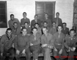 Festive GIs pose in a group in the CBI during WWII. Kenneth Williams is second from right in front row. 