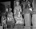 Figures inside a Buddhist temple in China.