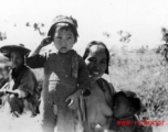 A mother and children in Yunnan province, China, during WWII.