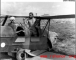 GI's horse around in crashed biplane.  In the CBI.  Photo from Glenn Hensley.