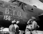 Chinese American Composite Wing (CACW) --Chinese pilot in the cockpit of the North American B-25 "B.T.O." give a "thumbs up" sign to other members of the Chinese and American Replacement Training Unit, prior to taking off on a mission. Karachi, India, during WWII.  Photo by 7th Photo Technician Squadron, 8th Reconnaissance Group.
