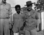 Big Chris, Bud Chapin, and another GI pose with local man in Chaukulia, India 1943.
