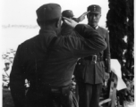 Chinese Lt. General Du Yuming, commander of Nationalist 5th Corps (第五集团军总司令兼昆明防守司令杜聿明) salutes Gen. Wei Lihuang (卫立煌) on stage during rally.